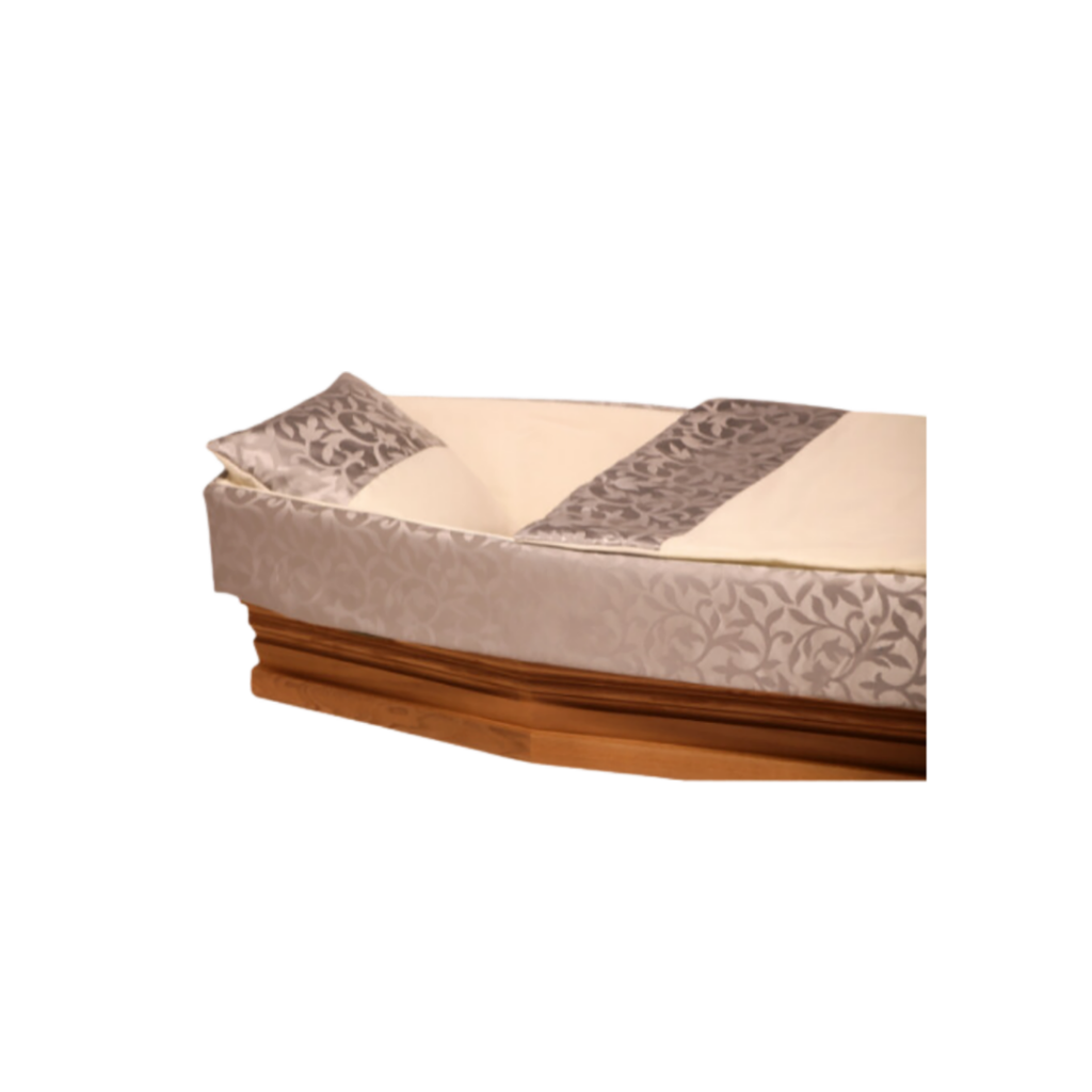 Cercueil en bois et tissu décoratif floral.